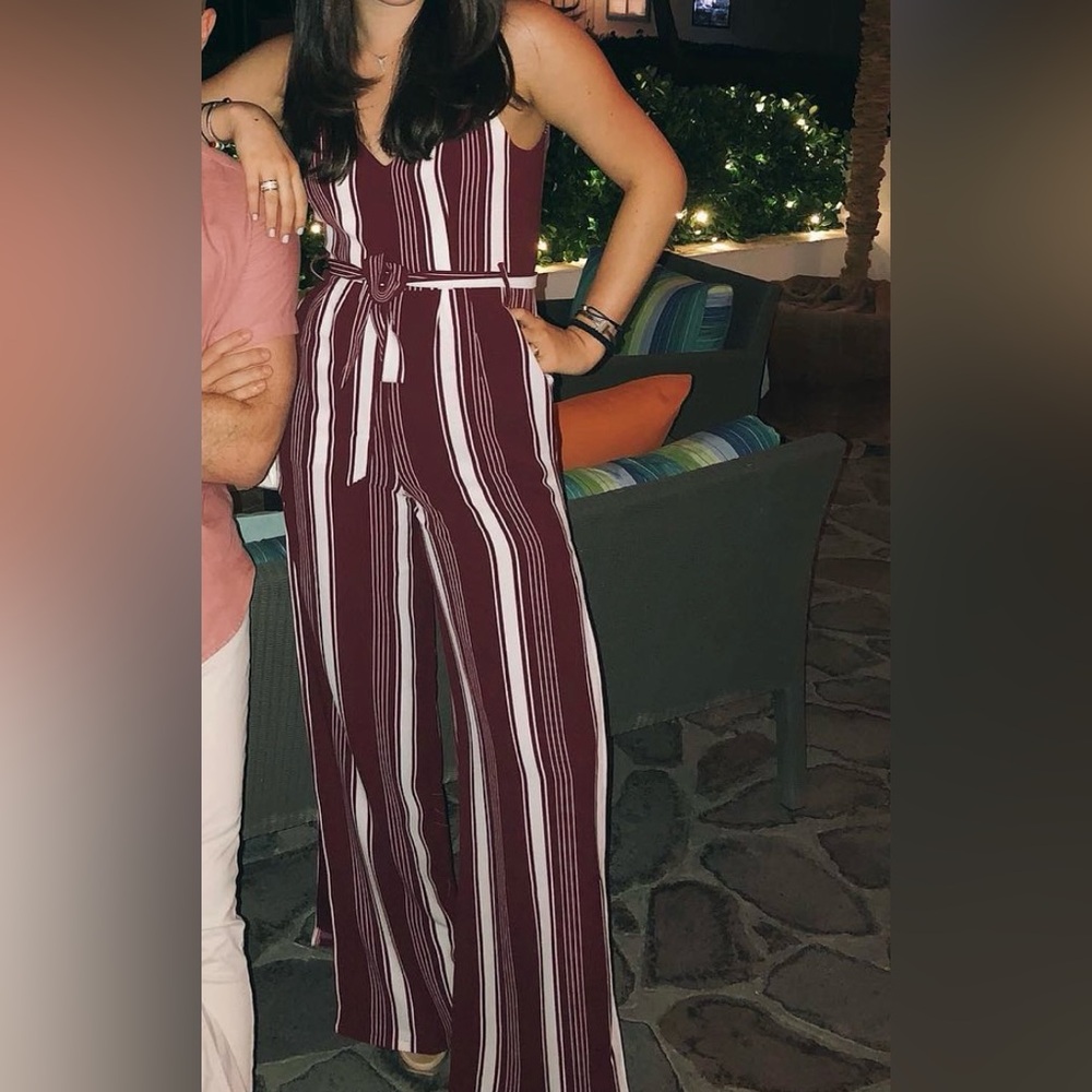 Maroon and white jump suit